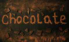 登记巧克力使可可粉除了块巧克力巧克力粉黑色的石墨背景