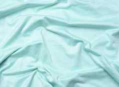 皱纹蓝色的棉花织物缝纫t恤服装