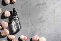 皮肤护理本质石油下降玻璃瓶鹅卵石