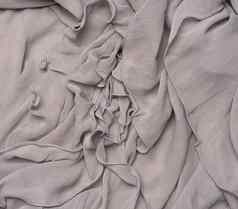 折叠灰色的丝绸织物完整的框架