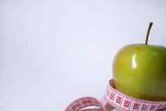 红色的测量磁带绿色苹果饮食健康的生活损失重量概念前视图复制空间孤立的