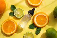 透明质酸酸柑橘类水果化妆品程序健康的皮肤皮肤护理柑橘类石油黄色的背景复制空间