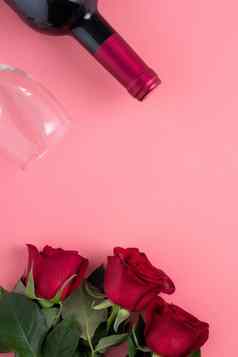 情人节一天约会礼物酒玫瑰概念粉红色的背景