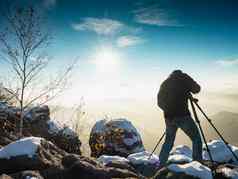 自然摄影师采取照片雪山