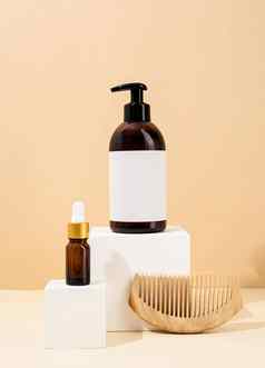 棕色（的）瓶模型自然护肤品化妆品水疗中心配件白色领奖台奶油背景