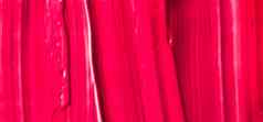 红色的化妆品纹理背景化妆护肤品化妆品产品奶油口红保湿霜宏奢侈品美品牌假期平铺设计