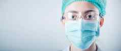 医疗外科手术医生健康护理肖像外科医生医生佩普设备孤立的背景医学女医生穿脸面具帽病人手术工作医生医院