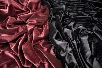 红色,黑色的光滑的天鹅绒造型的折叠光影图片
