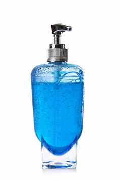 蓝色的液体肥皂透明的瓶孤立的