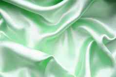 光滑的优雅的绿色丝绸背景