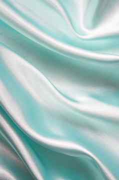 光滑的优雅的蓝色的丝绸背景