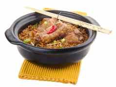 陶罐猪肉大米亚洲食物