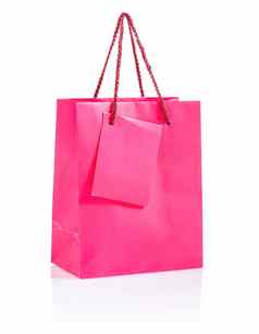 孤立的粉红色的纸袋