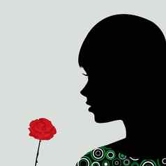 女孩闻玫瑰