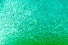 摘要宏清洁绿色泡沫拍摄背景肥皂泡沫光颜色反射影响