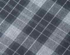 灰色苏格兰检查羊毛织物纹理背景