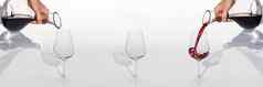 品酒 师倒红色的酒玻璃水瓶葡萄酒杯白色背景全景拍摄横幅