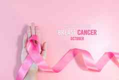 粉红色的丝带象征乳房癌症意识月运动woma