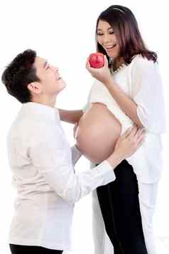 怀孕了妻子持有苹果站丈夫