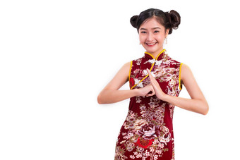 年轻的亚洲美女人穿旗袍祝福问候手势中国人一年节日事件孤立的白色背景假期生活方式概念旗袍衣服穿