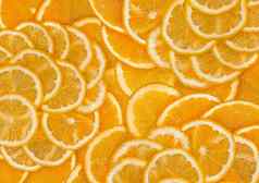切片橙色柠檬纹理新鲜的健康的食物水果背景