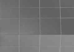 灰色的摘要广场建筑模式表面墙纹理背景