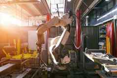 自动焊接机器人机械手臂工作现代汽车部分工厂