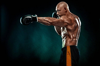 运动员男人。拳击手战斗手套黑色的背景健身拳击概念个人体育娱乐