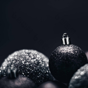 <strong>圣诞</strong>节假期节日装饰概念黑色的装饰物<strong>简约圣诞</strong>节背景
