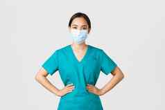 科维德冠状病毒疾病医疗保健工人概念快乐的微笑亚洲女医生医生实习医生风云医疗面具乐观的工作病人医院
