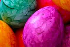 明亮的色彩斑斓的复活节鸡蛋背景春天节日