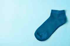 蓝色的袜子蓝色的背景空间文本