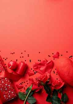 情人节一天礼物玫瑰蜡烛红色的背景复制空间