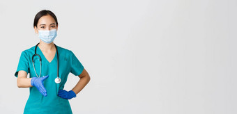 科维德冠状病毒疾病医疗保健工人概念自信年轻的亚洲女医生医生实习医生风云医疗面具手套扩展手握手问候病人