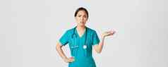 科维德医疗保健工人流感大流行概念沮丧生气亚洲女医生护士实习医生风云提高手质疑被激怒抱怨