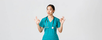 科维德医疗保健工人流感大流行概念深刻的印象好看的亚洲女护士实习医生风云医生显示手势点头批准赞美优秀的选择赞美