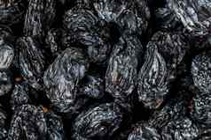 黑色的葡萄干纹理受欢迎的干水果干葡萄