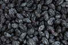黑色的葡萄干纹理受欢迎的干水果干葡萄
