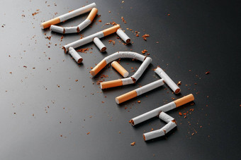 登记死亡香烟黑色的背景停止吸烟概念吸烟杀死动机登记辞职吸烟不健康的习惯