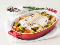 鱼鳕鱼烤烤箱蔬菜健康的饮食健康的食物光白色木背景一边视图