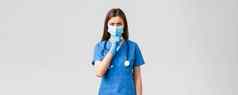 科维德防止病毒健康医疗保健工人检疫概念愤怒的女护士蓝色的实习医生风云医疗面具警告的声音安静的嘘声相机