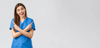 医疗保健工人防止病毒保险医学概念热情的微笑女护士医生蓝色的实习医生风云指出手指横盘整理左显示产品横幅