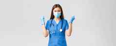 科维德防止病毒健康医疗保健工人检疫概念鼓励快乐女护士医生蓝色的实习医生风云庆祝穿医疗面具高喊成功