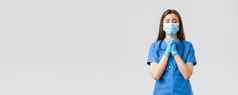科维德防止病毒健康医疗保健工人检疫概念充满希望的女护士医生蓝色的实习医生风云医疗面具祈祷生活病人生病的冠状病毒感染