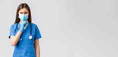 科维德防止病毒健康医疗保健工人检疫概念愤怒的女护士蓝色的实习医生风云医疗面具警告的声音安静的嘘声相机