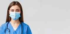 科维德防止病毒健康医疗保健工人检疫概念特写镜头年轻的女护士医生蓝色的实习医生风云医疗面具相机