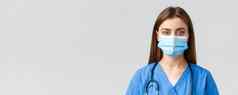 科维德防止病毒健康医疗保健工人检疫概念特写镜头年轻的女护士医生蓝色的实习医生风云医疗面具相机