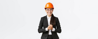 微笑专业亚洲女商人安全头盔业务西装<strong>介绍企业</strong>客户投资者显示使演讲建设区域