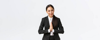 友好的亚洲女商人持有手鞠躬业务合作伙伴问候客户女企业家纳马斯特客户白色背景