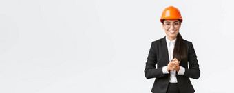 微笑专业亚洲女商人安全头盔业务西装介绍企业客户投资者显示使演讲建设区域